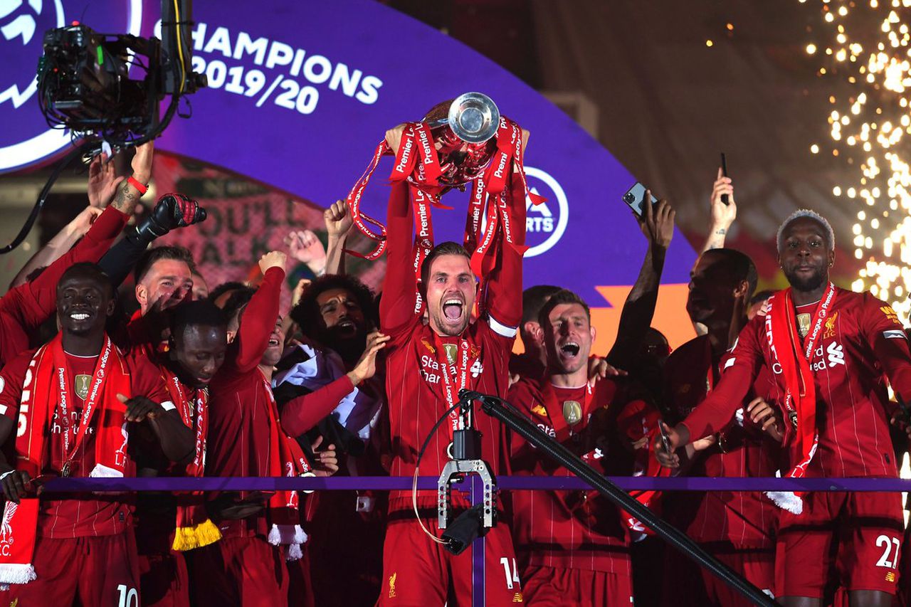 Liverpool finally lifts the English Premier League trophy following an action-packed 5-3 win against Chelsea at Anfield