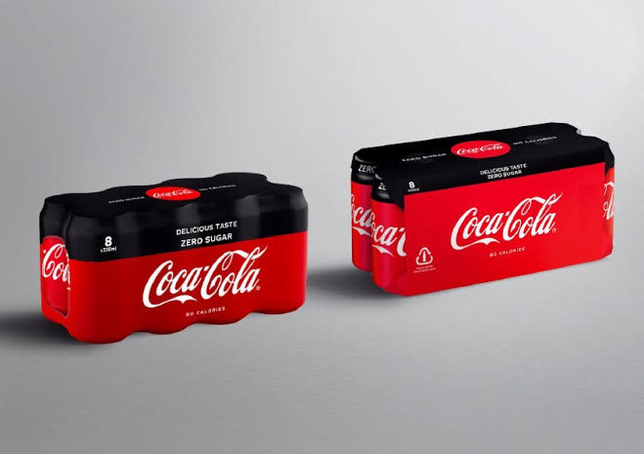 The company will replace all their plastic wraps in Europe with paper by 2021, image via Coca-Cola
