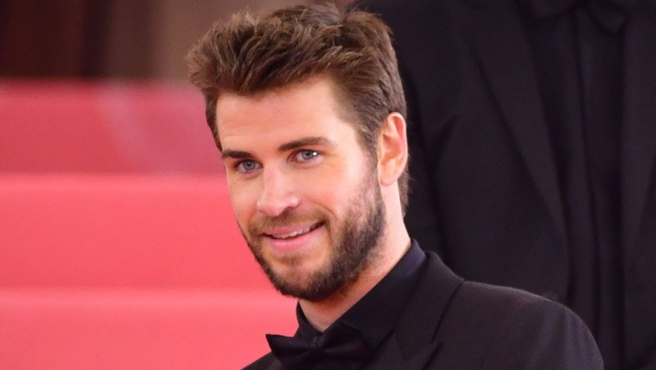 Liam Hemsworth is being sued by Splash News and Picture Agency for unauthorized use of copyrighted content. Image via Getty Images.