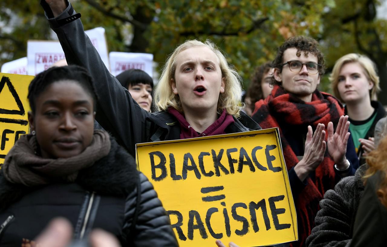 Antiracism protesters demand end to 'Black Pete' character traditional Dutch celebration. Image via Reuters.