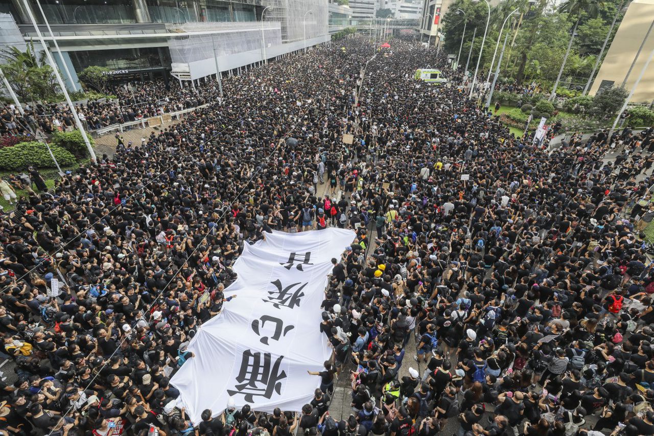 In a surprising move, the police have given their approval for these protests, image via South China Morning Post