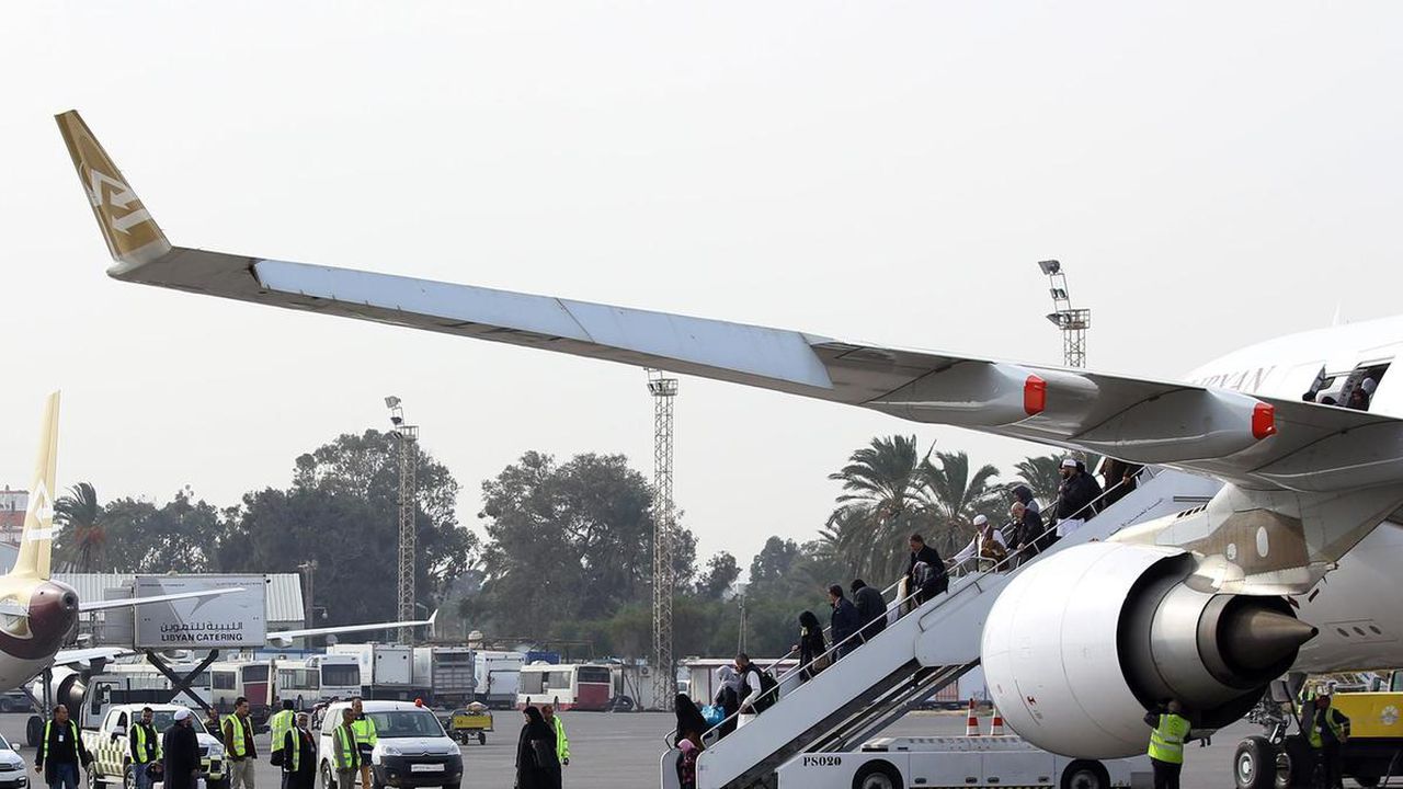 Tripoli's only working airport Mitiga reopens after day of shelling from Haftar forces. Image via AFP.