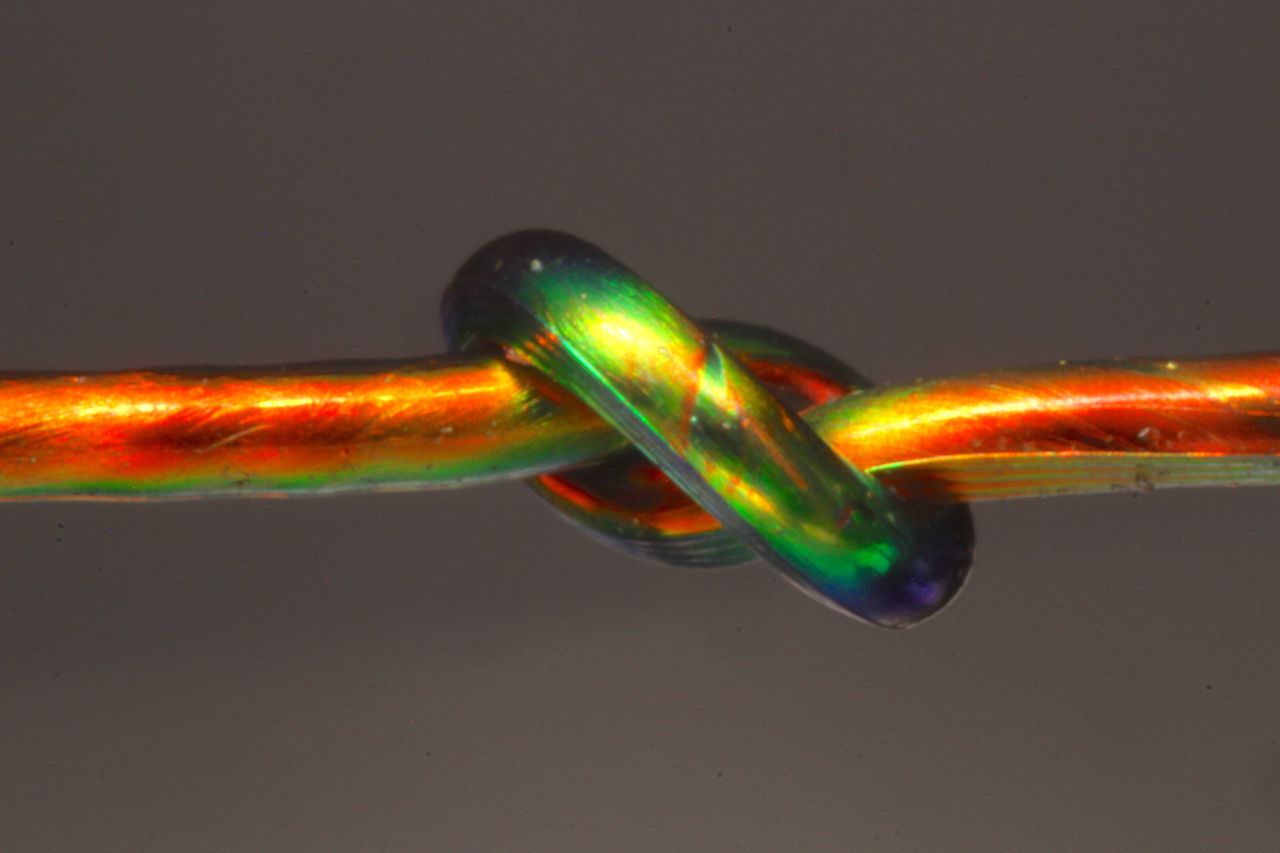 MIT researchers used color-changing fibers to perform a landmark study of knot strength and strain. Image via Pinterest.