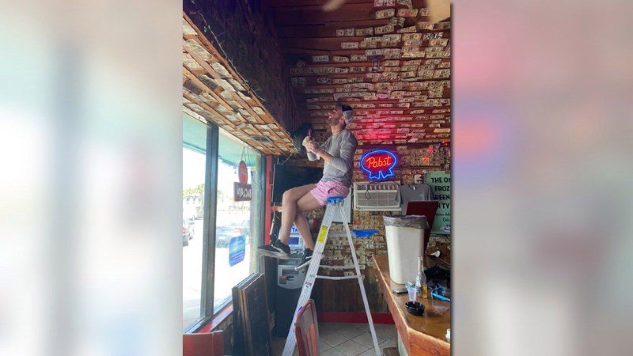 Georgia bar owner removes $3,714 worth of bills stapled to the walls to give to unemployed staff