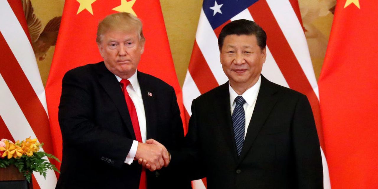 Donald Trump says "China cheated America on trade”, Image via Reuters / Jonathan Ernst