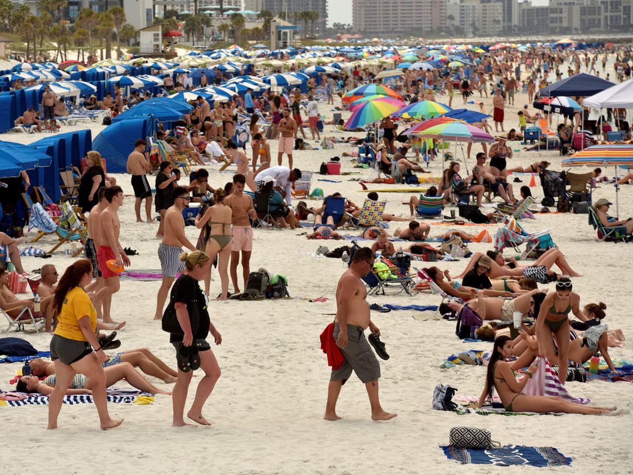 Florida reports 15,299 cases in a record single-day spike