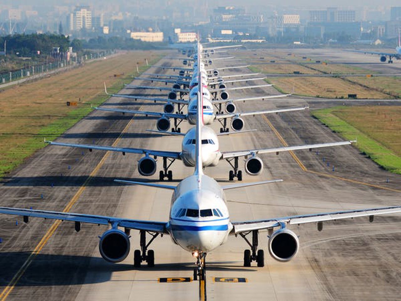 Many airlines have had to seriously reduce international travel, image via Getty Images