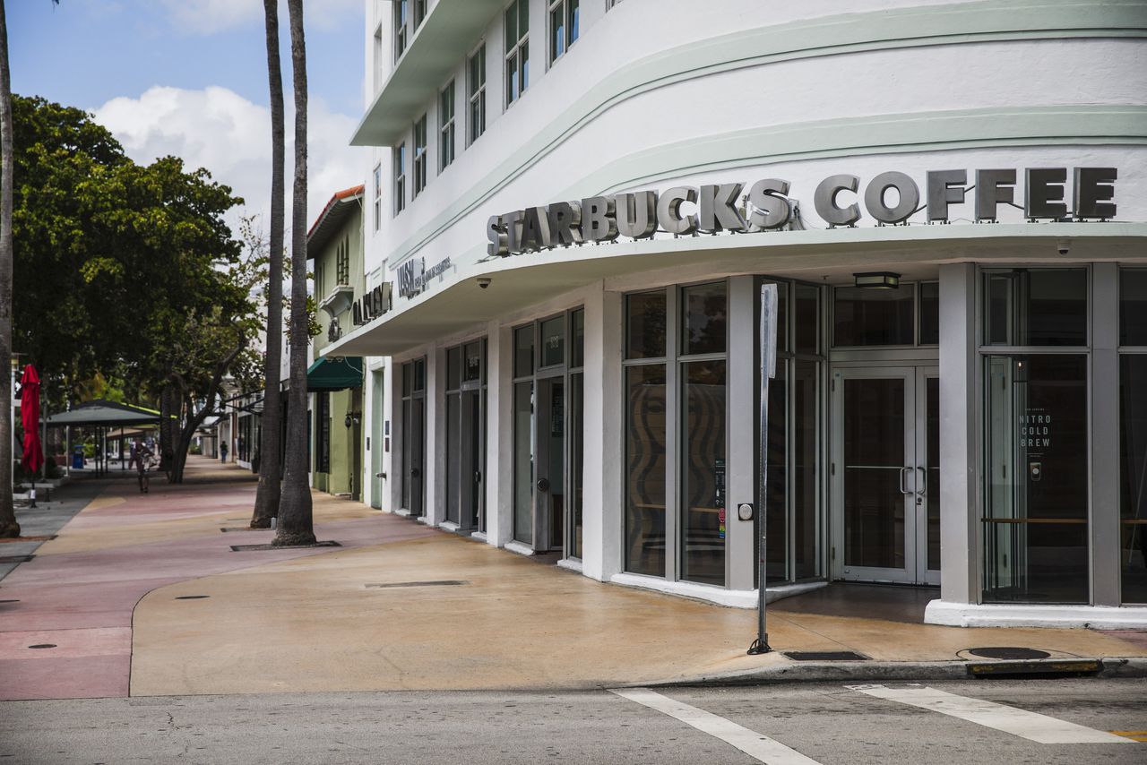 Starbucks to close US, Canada locations due to coronavirus pandemic. Image via Bloomberg.
