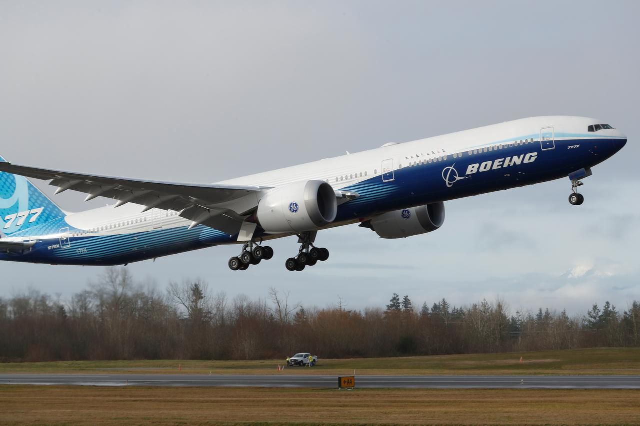 Boeing successfully tests the 777X, the largest twin-engine plane in the world. Image via Reuters.