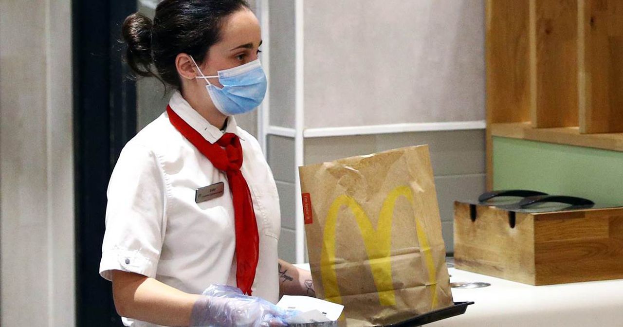 McDonald's to continue pause on dining room reopenings, will require customers to wear masks