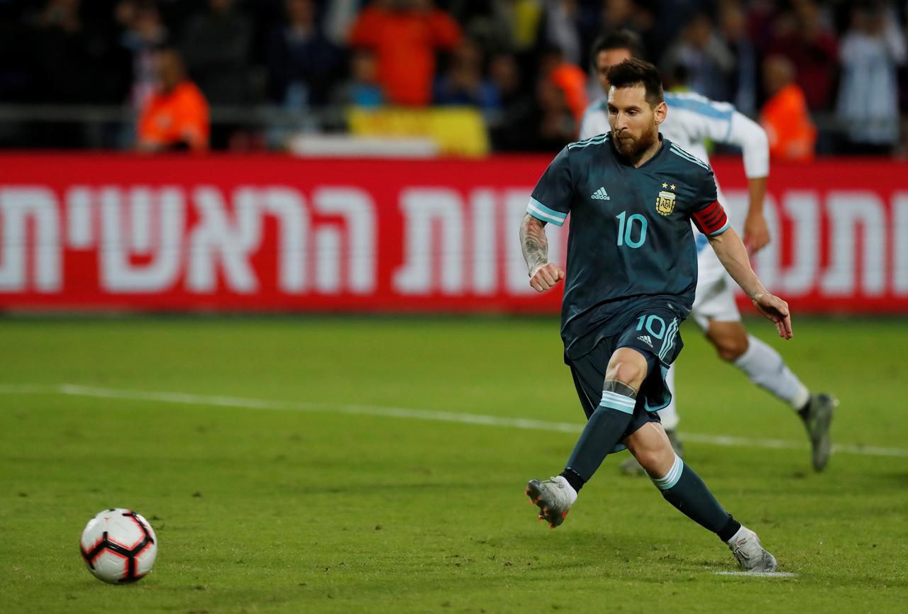 Messi's equalizer brings Argentina back for a tie with Uruguay. Image via Reuters.