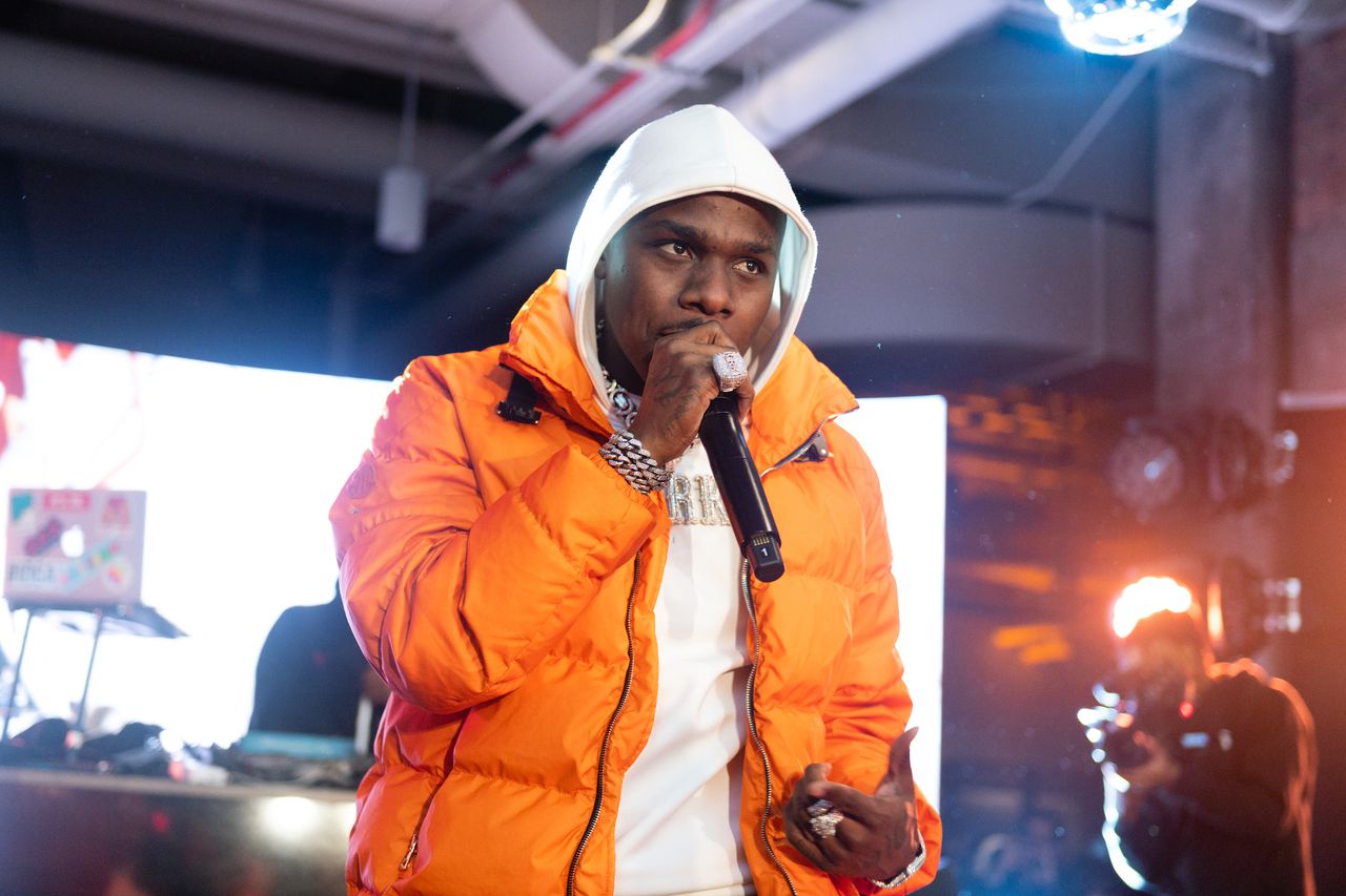 DaBaby assaulted a fan before his concert and got booed off stage. Image via Stereogum.
