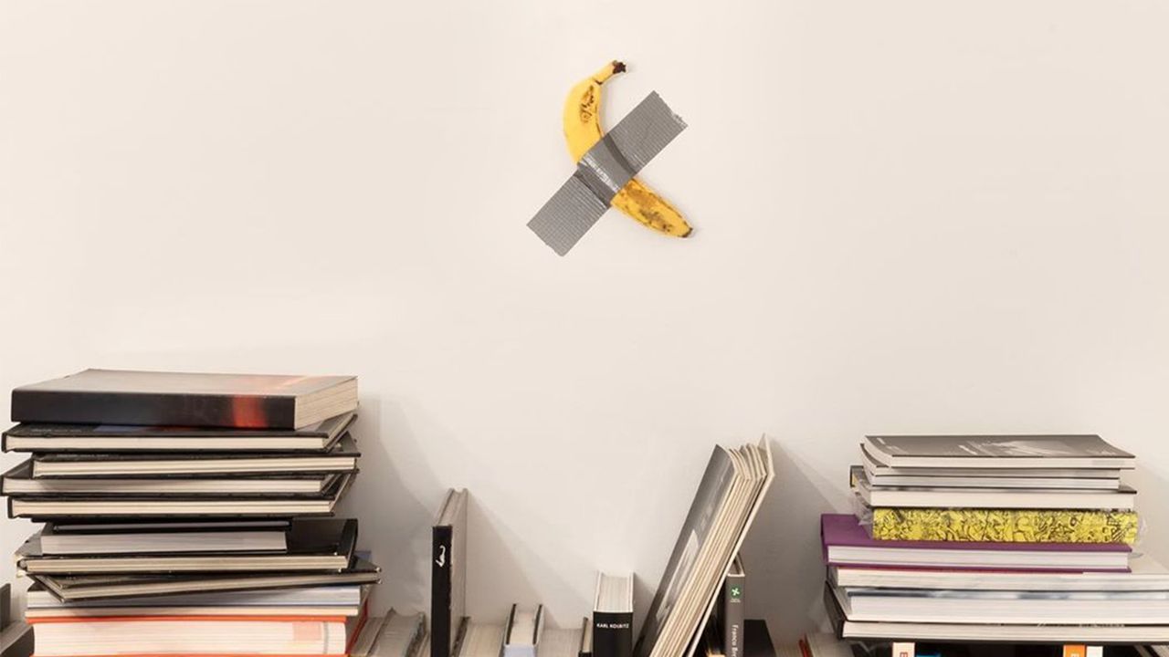 Comedian features a banana taped to a wall, and was sold for 120,000 USD in a Miami exhibition. Image via Nypost.