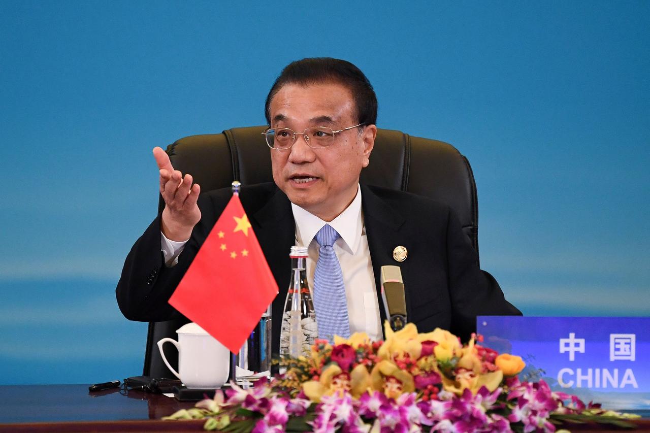 Chinese premier Li Keqiang urges Hubei officials to report any new coronavirus cases honestly. Image via Reuters,