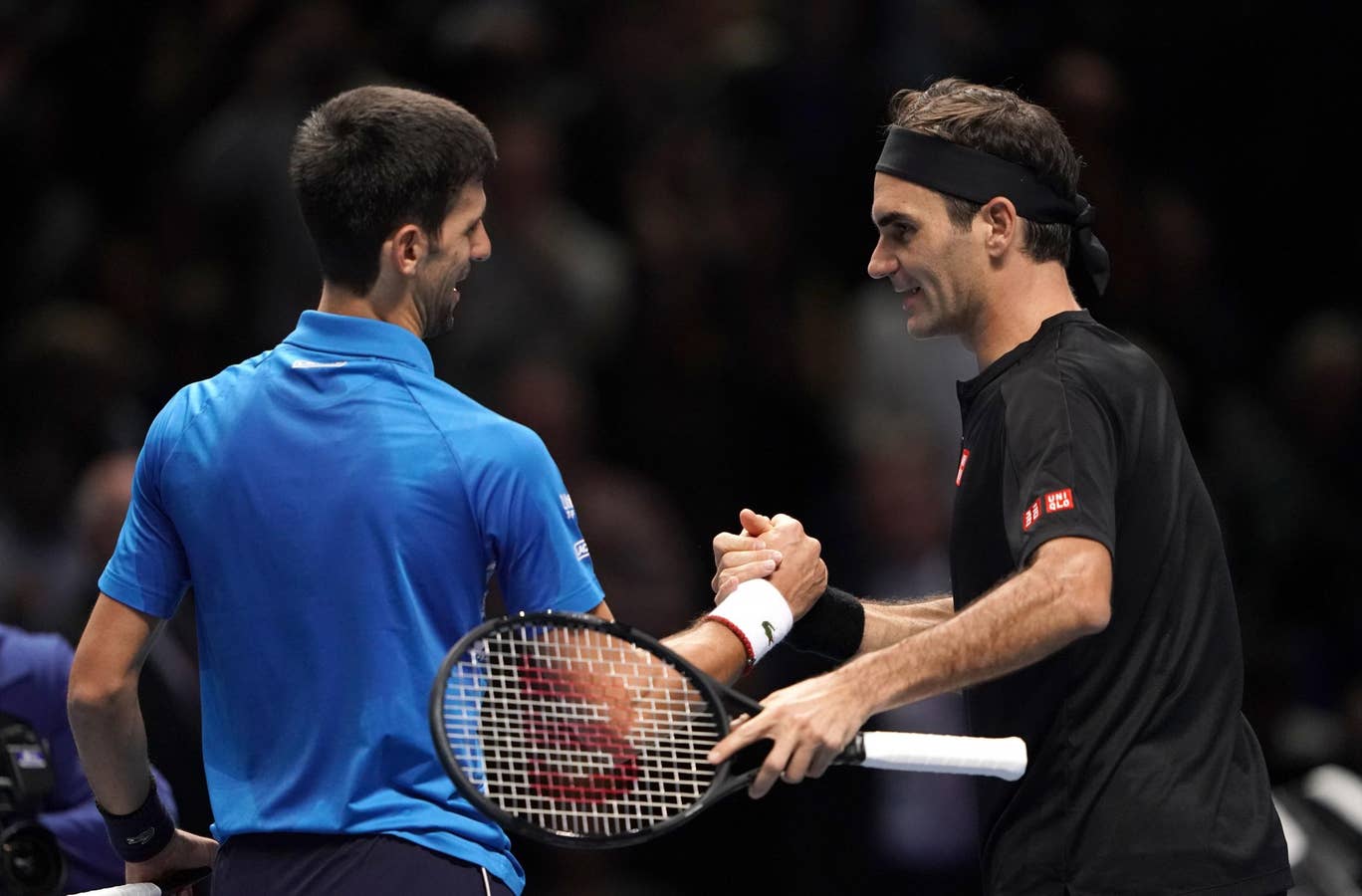 Federer delivers a clinical win over rival Djokovic in ATP finals. Image via PA.