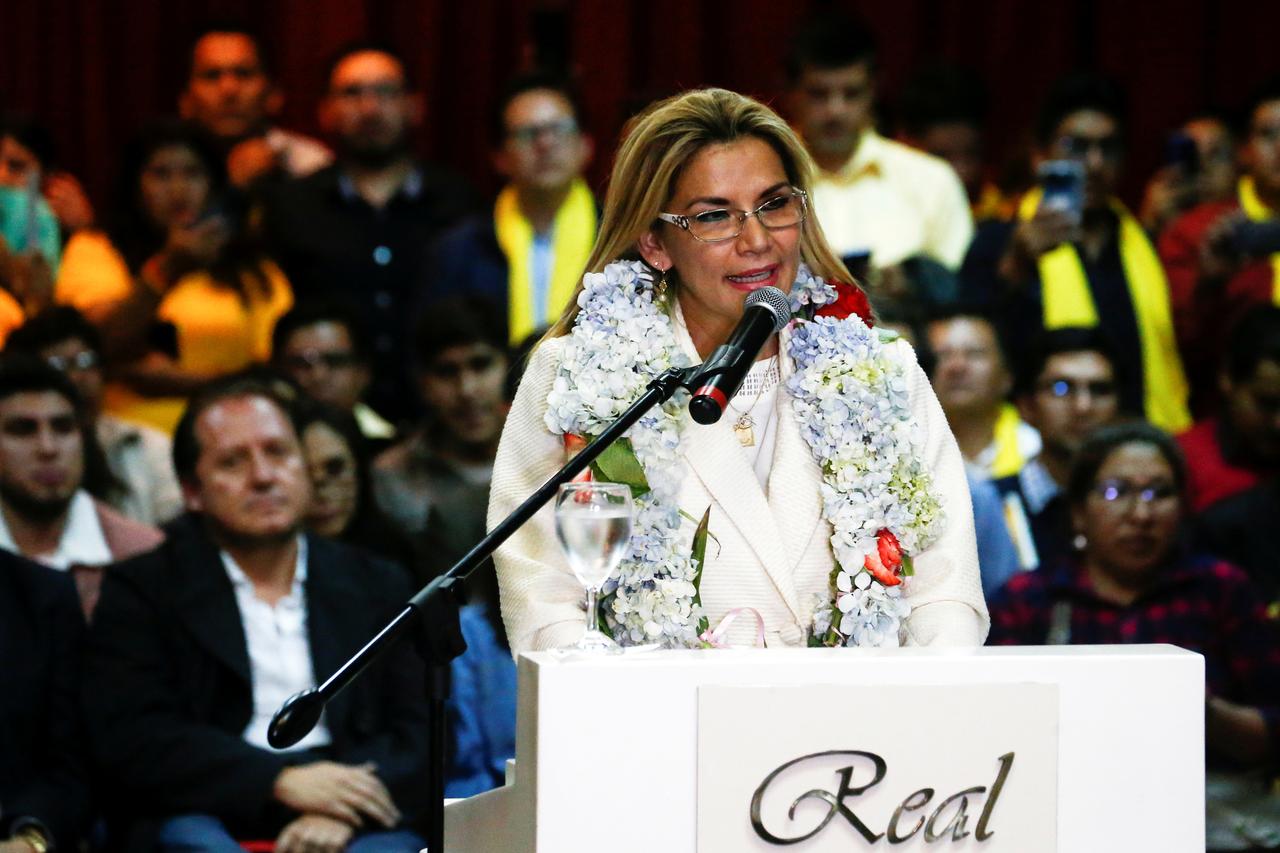 Bolivian interim president Jeanine Anez, former TV anchor and lawyer, announces presidential campaign. Image via Reuters.