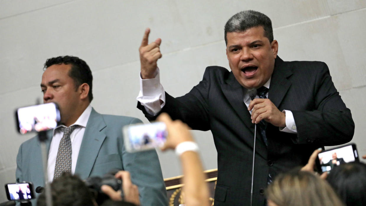 Venezuela Congress elects new leader, posting armed guards outside to prevent opposition party from walking in. Image via France24.