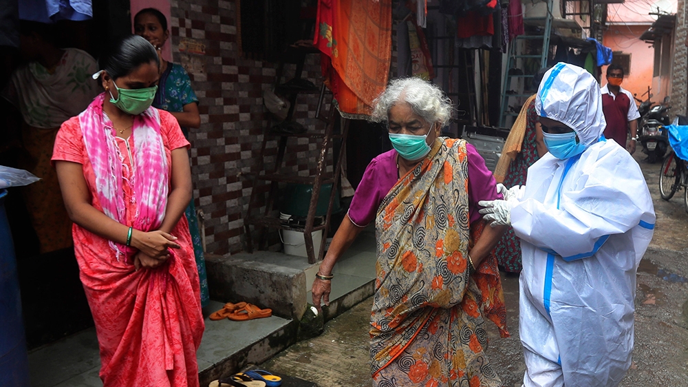 India's coronavirus death toll surpasses 50,000: Live updates