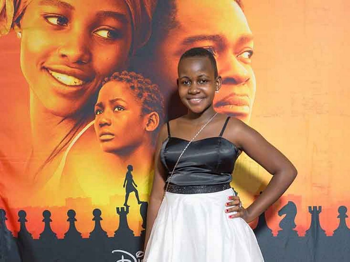 15-year-old Ugandan Disney film star Nikita Waligwa has died of a brain tumor. Image via The US Sun.